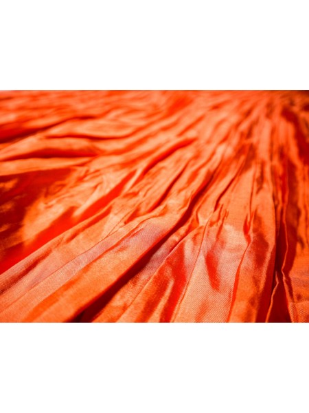 Falda plisada naranja de satén con cintura alta – Núria Aymerich