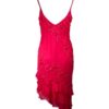 Vestido fucsia con pedrería y volantes asimétrico