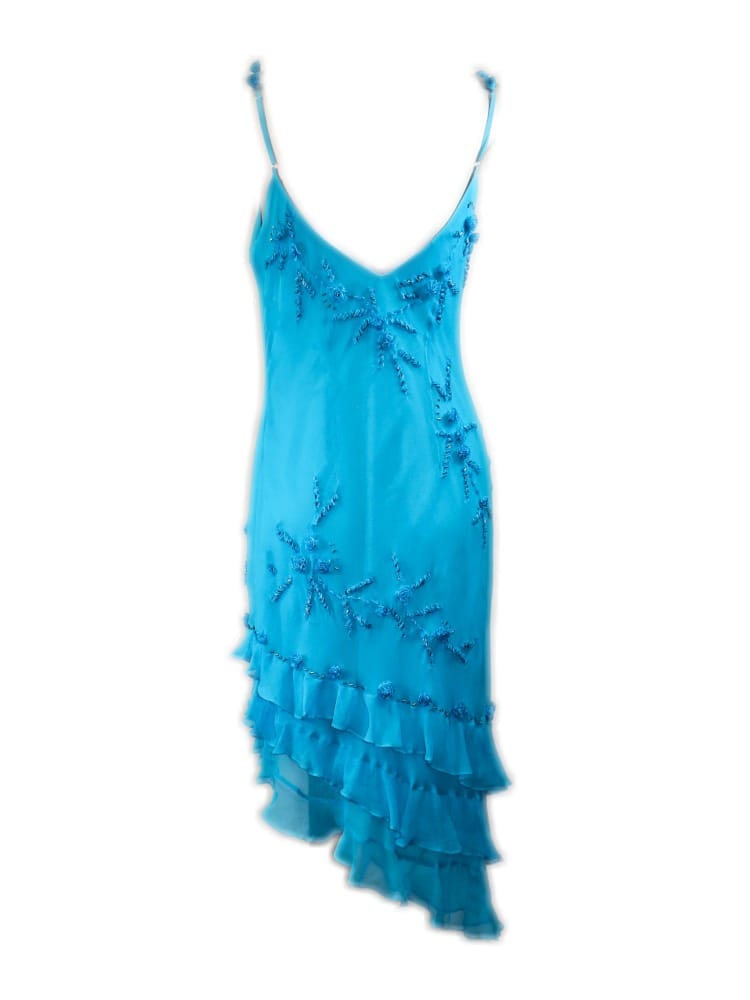 Vestido azul con pedrería y volantes asimétrico