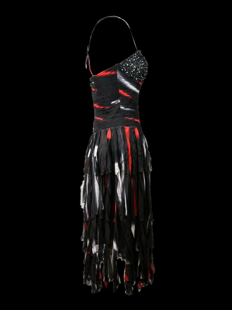 Vestido sun dress midi, en crepé de seda negro con estampado Vestido sun dress midi, en crepé de seda negro con estampado
